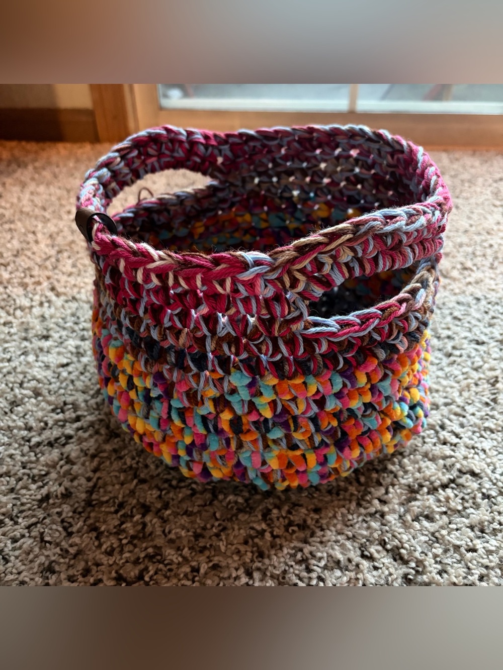 Multicolored crochet scrap basket perfect for storage